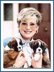 Author with Champion Intrends Fiddlededee and her sister at 7 weeks in 1990